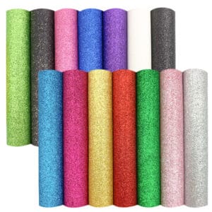 Rouleau de Flex Glitter (vinyle pailleté) déroulé montrant la texture scintillante pour transfert textile.