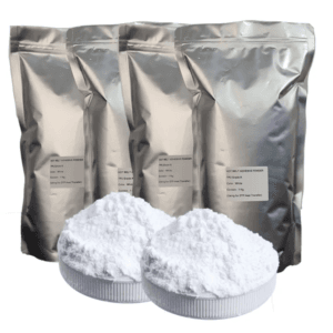 Trois sachets argentés de 1kg de poudre adhésive thermofusible (Hotmelt) avec un tas de poudre polyamide blanche au premier plan, disponible chez Disenprint Maroc.